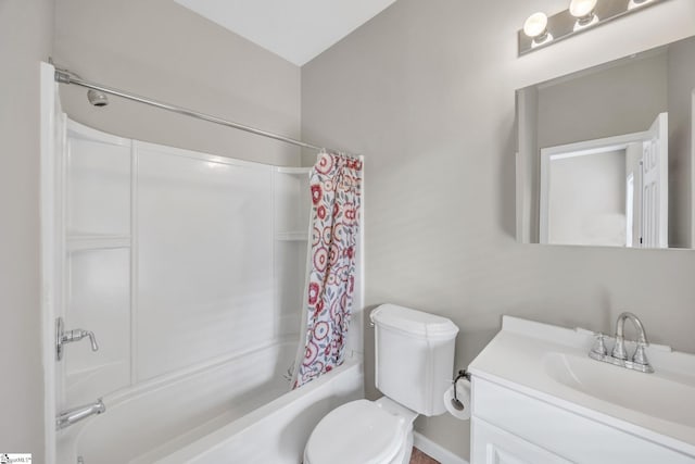 full bathroom featuring shower / bath combination with curtain, toilet, and vanity