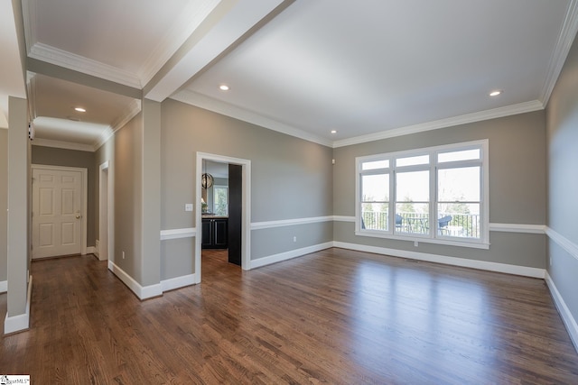 spare room with beam ceiling, crown molding, and dark hardwood / wood-style flooring