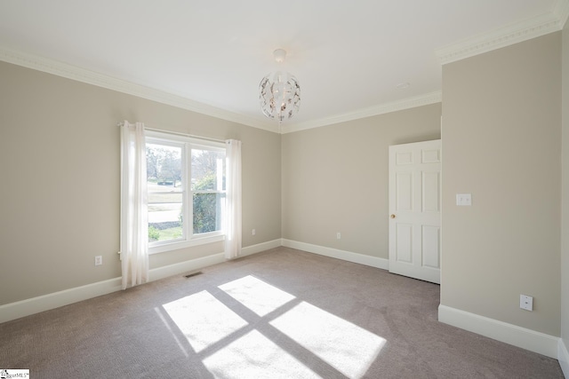 unfurnished room with light colored carpet, crown molding, and a chandelier