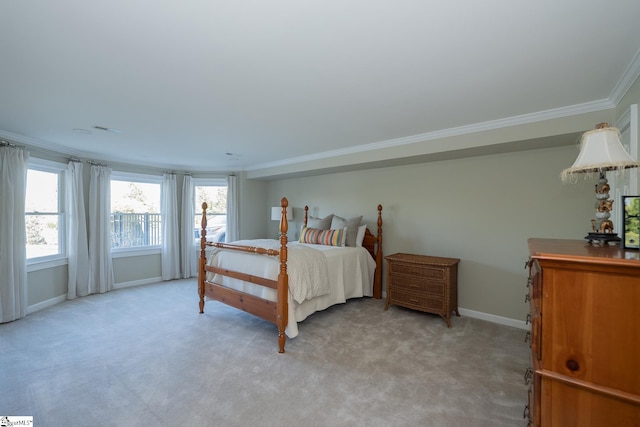 bedroom featuring light carpet and crown molding