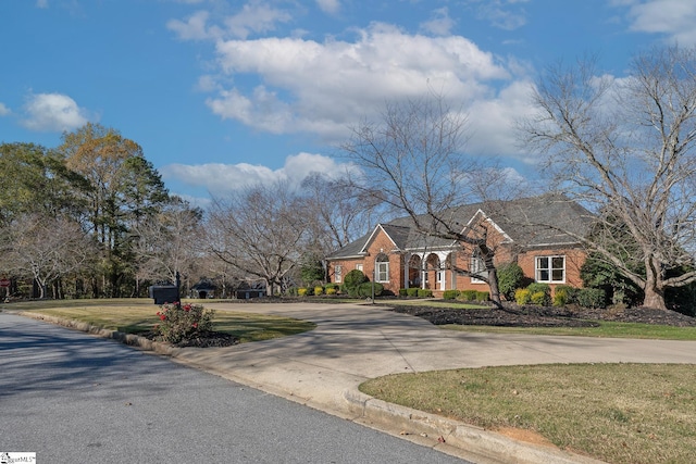 view of front of home with a front lawn