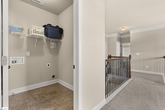 clothes washing area with carpet flooring, electric dryer hookup, crown molding, and hookup for a washing machine