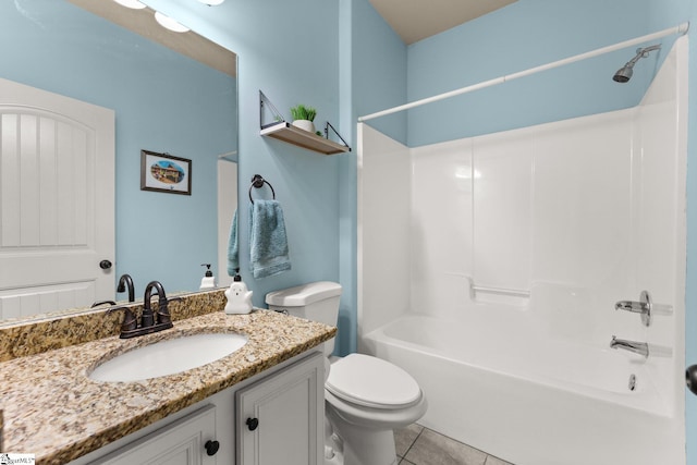 full bathroom with tile patterned floors, bathing tub / shower combination, vanity, and toilet