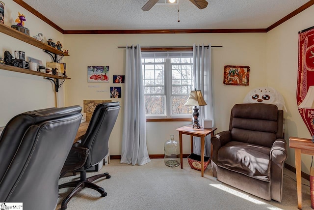 office featuring a textured ceiling, carpet floors, ceiling fan, and crown molding