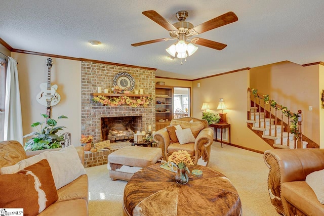 living room featuring ceiling fan, a brick fireplace, crown molding, a textured ceiling, and light carpet