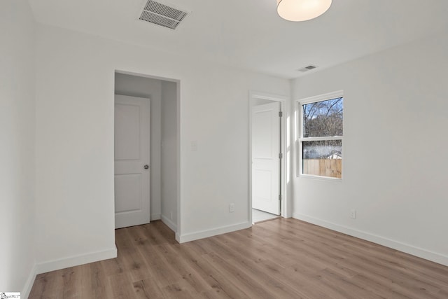 unfurnished bedroom with light hardwood / wood-style flooring