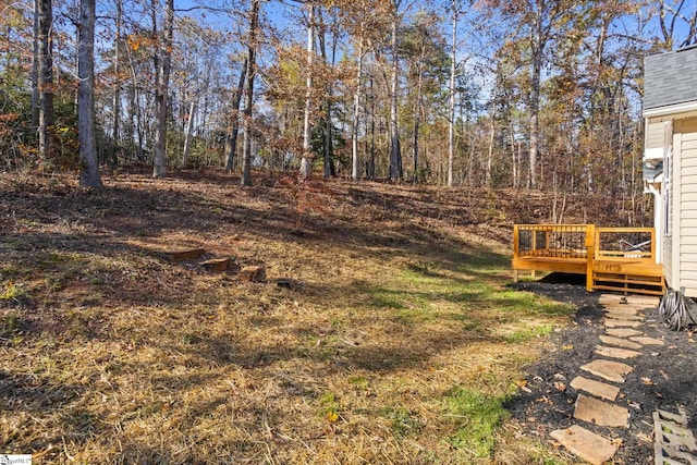 view of yard featuring a deck