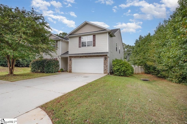 front facade featuring a front yard and a garage