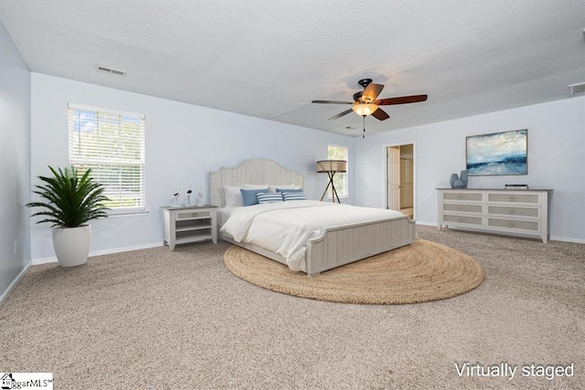 bedroom featuring carpet floors and ceiling fan