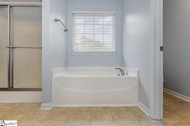 bathroom with independent shower and bath