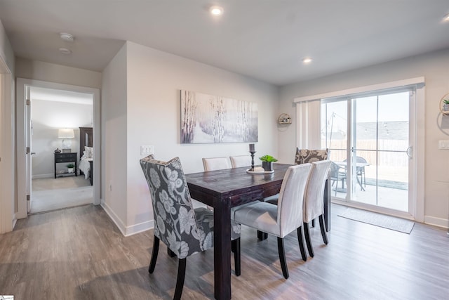 dining room with light hardwood / wood-style flooring