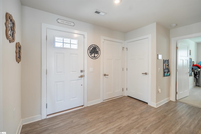 entrance foyer featuring light hardwood / wood-style flooring