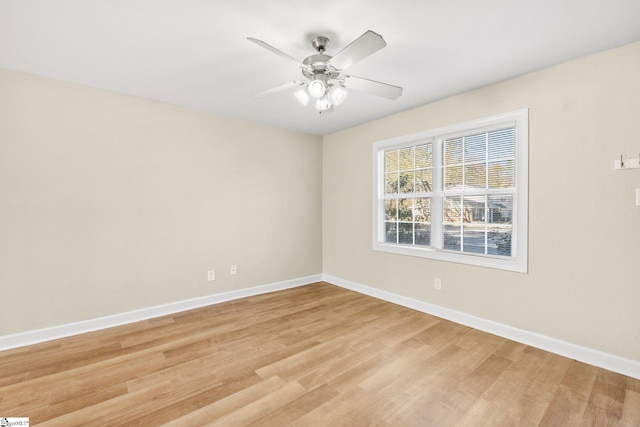 unfurnished room featuring ceiling fan and light hardwood / wood-style floors