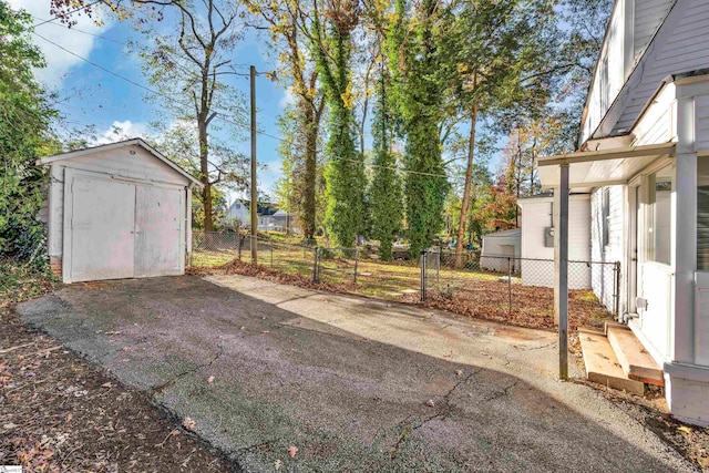 view of patio / terrace featuring a shed