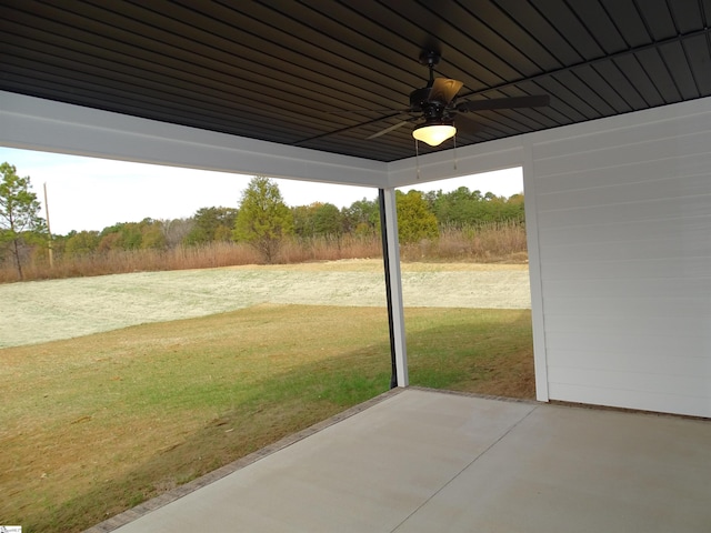 view of patio / terrace featuring ceiling fan