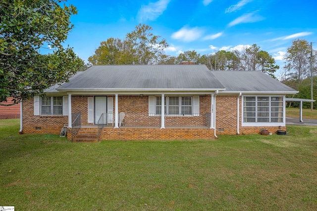 ranch-style house with a front lawn