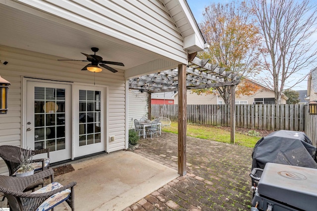 view of patio with ceiling fan, a grill, and a pergola