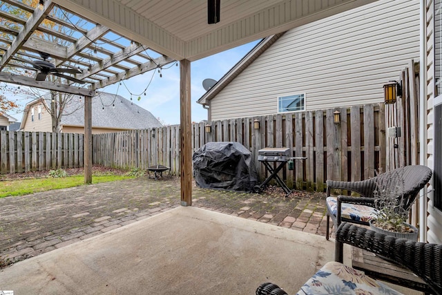 view of patio / terrace featuring a pergola, grilling area, and ceiling fan