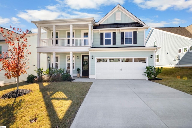 view of front of house featuring a garage and a front lawn