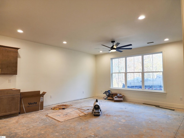 unfurnished room with ceiling fan