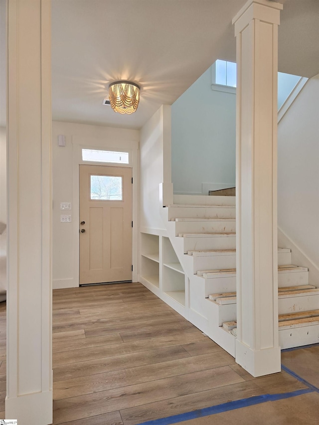 foyer entrance featuring light wood-type flooring