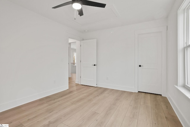 unfurnished bedroom featuring light hardwood / wood-style floors and ceiling fan