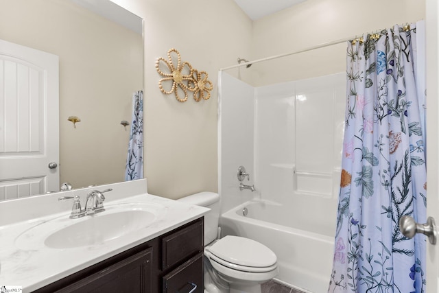 full bathroom featuring vanity, shower / tub combo, and toilet