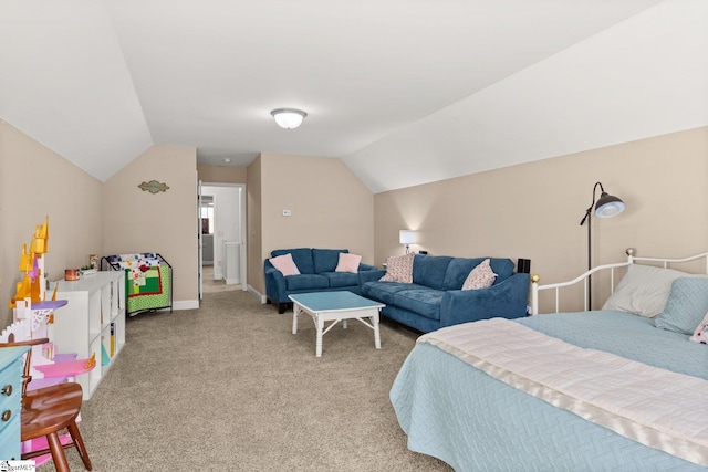 bedroom with light colored carpet and vaulted ceiling