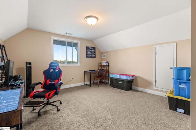 office space with lofted ceiling and carpet floors