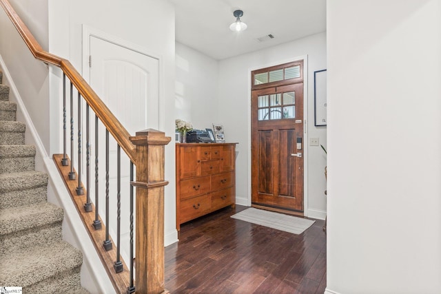 entrance foyer featuring dark hardwood / wood-style flooring