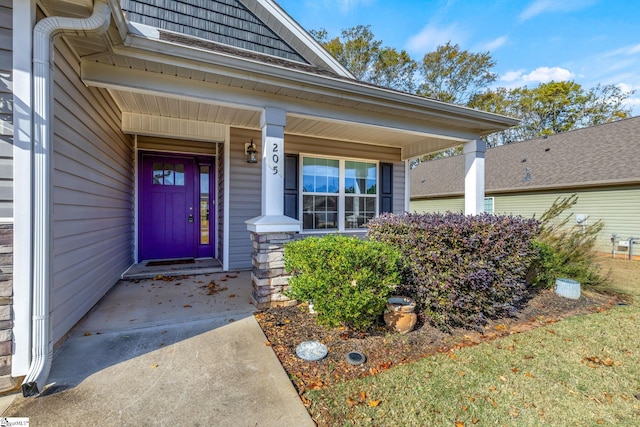 property entrance featuring a porch