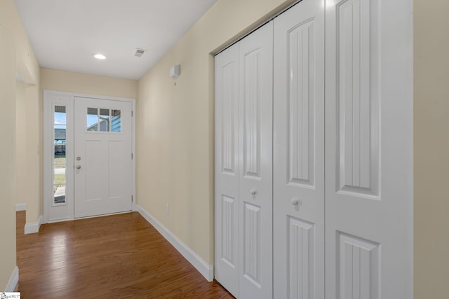 foyer with hardwood / wood-style flooring