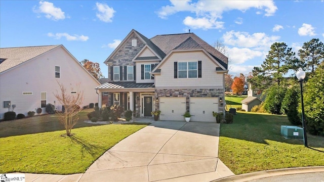 view of front of property featuring a garage and a front lawn