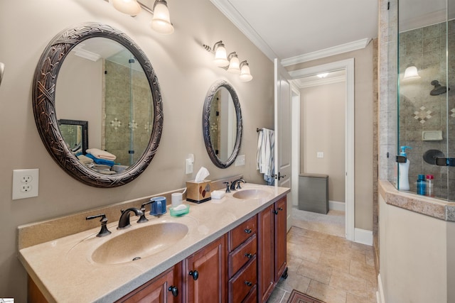 bathroom with tiled shower, vanity, and crown molding