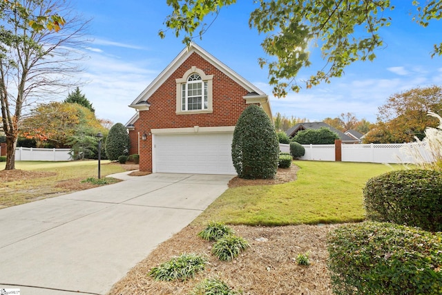 view of home's exterior with a lawn and a garage