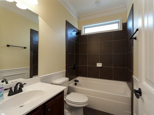 full bathroom featuring vanity, toilet, tiled shower / bath, and ornamental molding