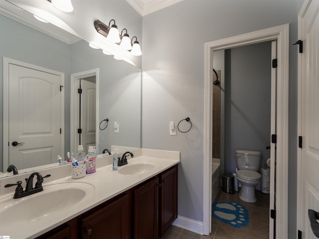 full bathroom featuring vanity, bathtub / shower combination, tile patterned floors, toilet, and ornamental molding