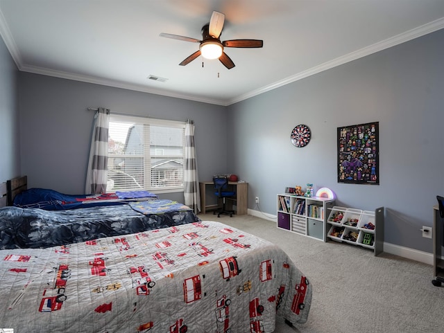 bedroom featuring carpet, ceiling fan, and crown molding