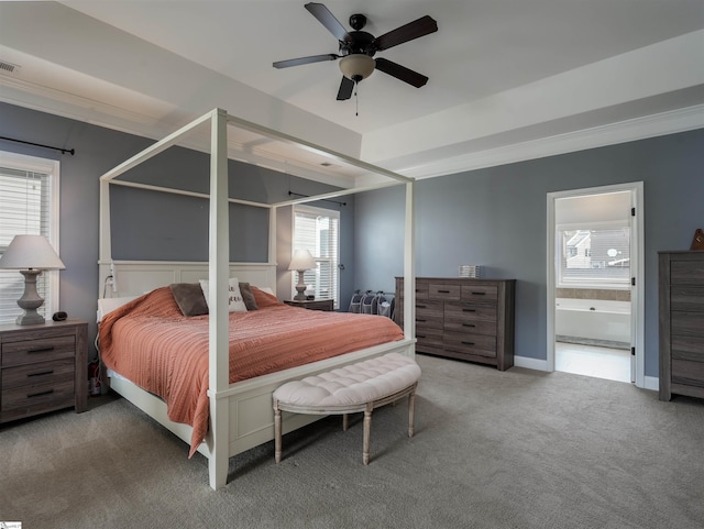 bedroom featuring connected bathroom, ceiling fan, carpet, and multiple windows