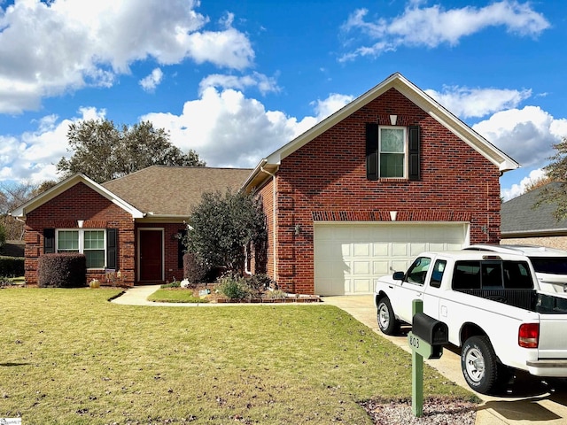 view of front property with a garage and a front lawn