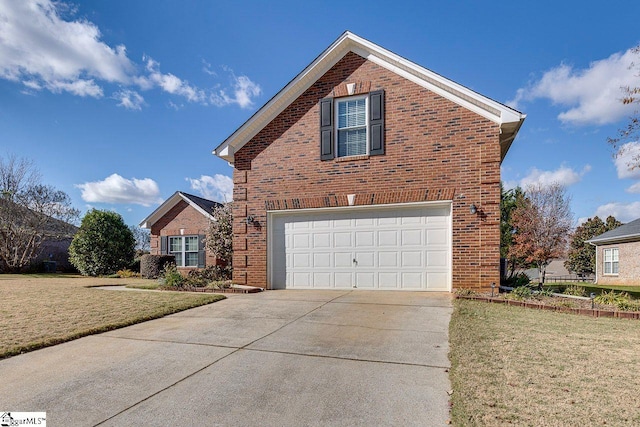 view of front property featuring a front lawn and a garage