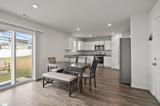 dining room featuring dark hardwood / wood-style floors