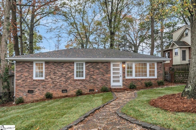 view of front facade with a front lawn