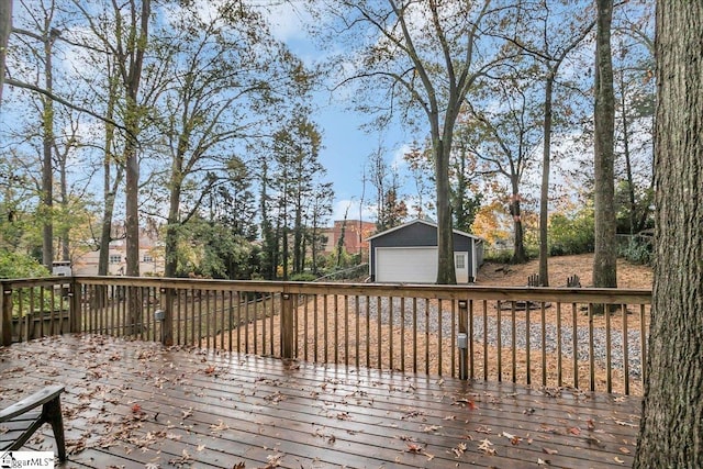 wooden deck featuring an outbuilding