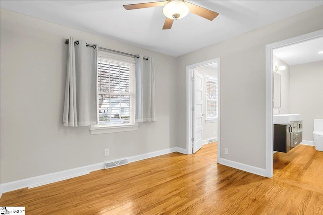 interior space featuring ceiling fan and light wood-type flooring