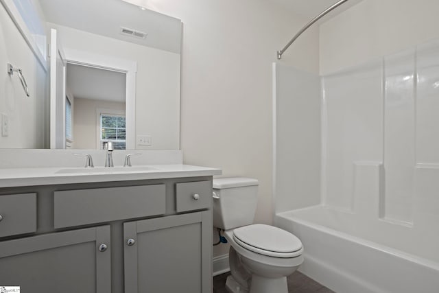 full bathroom with vanity, toilet, and shower / bath combination