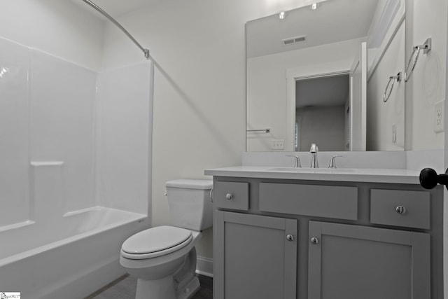 full bathroom featuring vanity, toilet, and washtub / shower combination