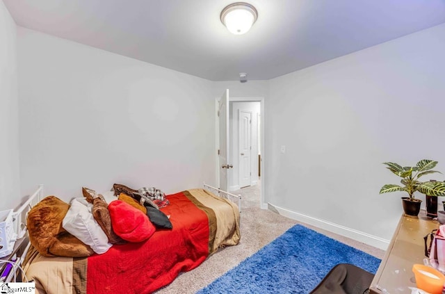 bedroom featuring carpet