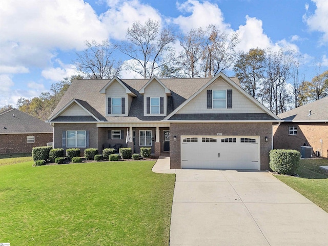 craftsman-style house with a front lawn, cooling unit, and a garage