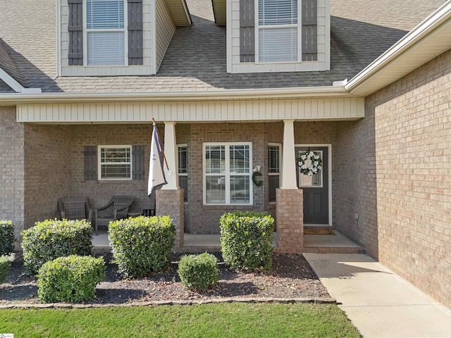 property entrance featuring a porch